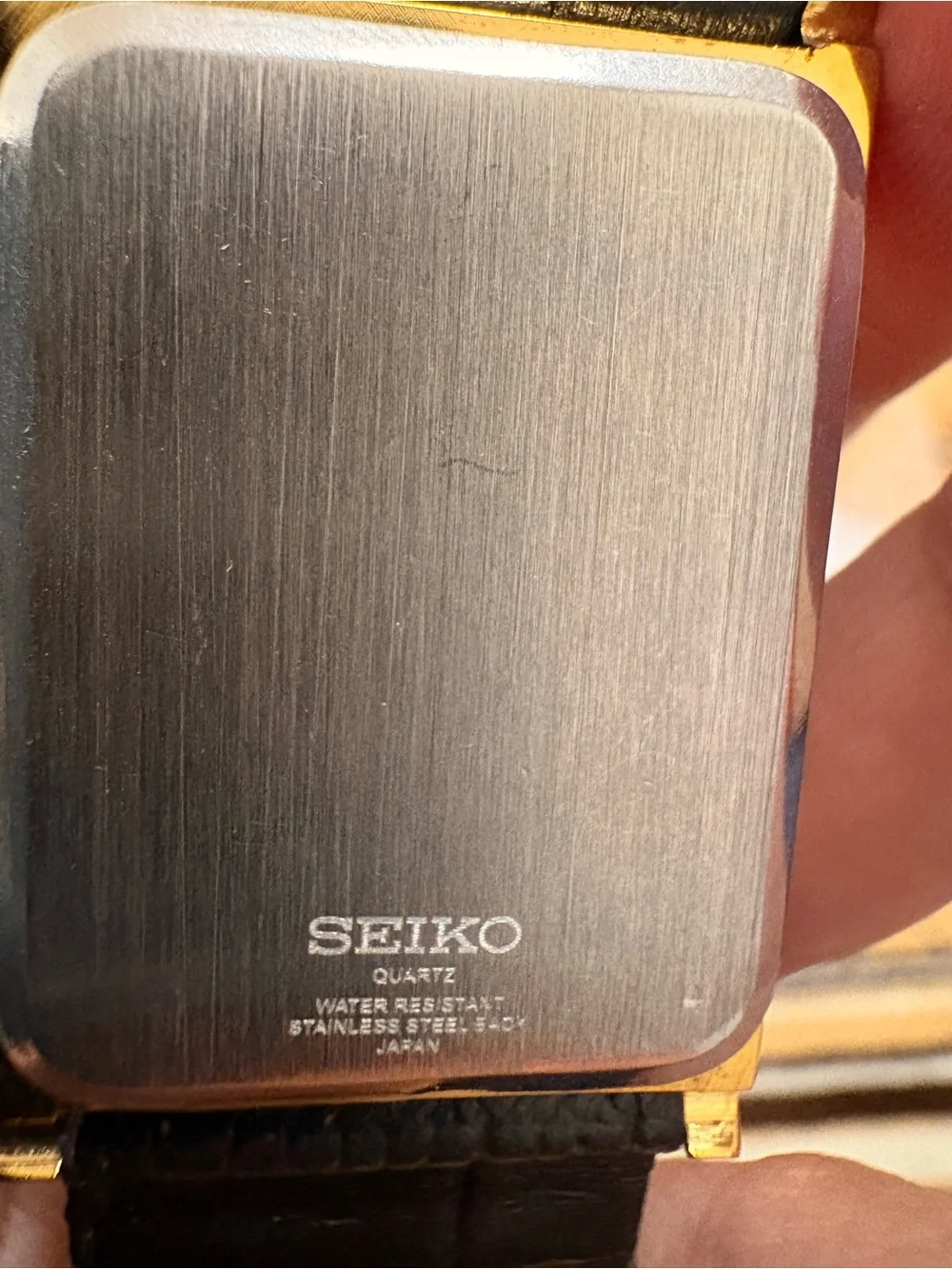 Seiko Gold-Tone Watch with Black Leather Strap